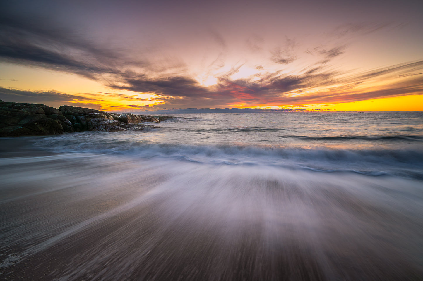 Solnedgang ved havet